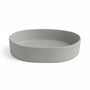 Cuba de sobrepor oval Torneira Online em cerâmica cinza fosco, design contemporâneo para banheiros e lavabos.